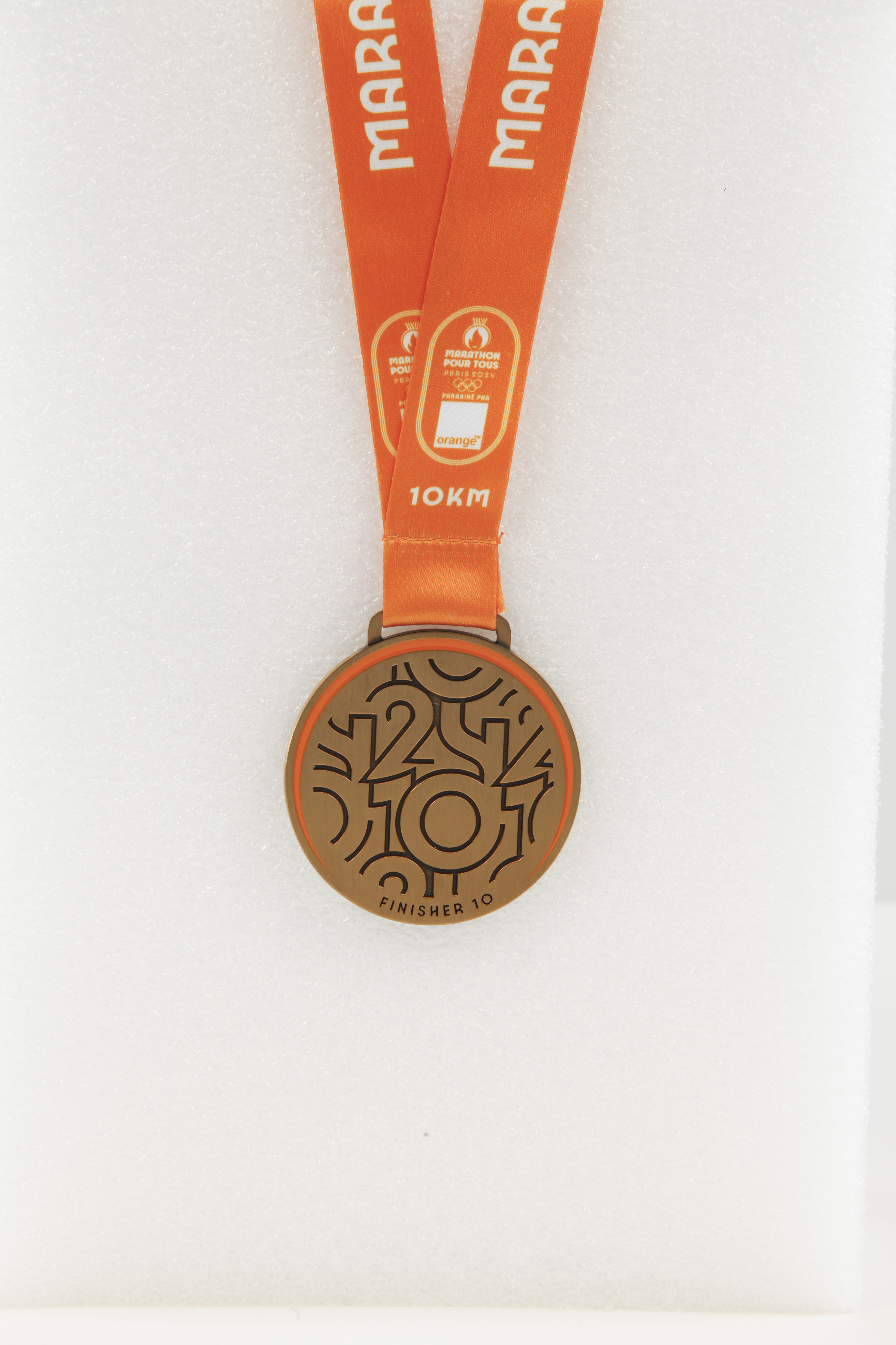 Médaille du 10km Marathon pour tous Paris 2024